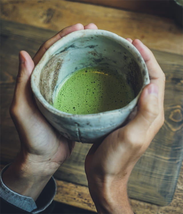 A bowl of matcha tea