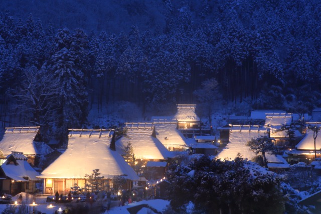 A group of houses covered in snow